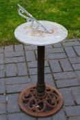 A garden sundial, 80 cm x 35 cm.
