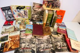 A collection of publications with themes to include movies, motoring, antiques,