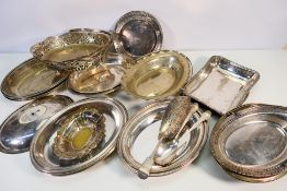 A collection of plated wares to include dishes, tray, baskets and other.
