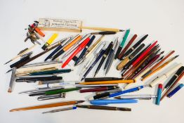 A collection of vintage pens, propelling pencils and similar.