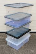 Five clear plastic storage boxes approximately 32L capacity,