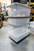 Five clear plastic storage boxes approximately 32L capacity,