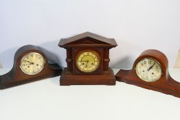 Three mantel clocks, largest approximately 33 cm (h).