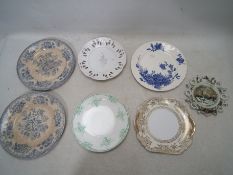 A collection of 9 boxed collector plates, to include a boxed plate that has a squirrel on it,