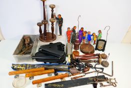 A mixed lot to include treen, glassware, door handles,