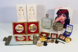 A mixed lot to include Joan Collins My Secrets, decorative porcelain plaques, sovereign case,