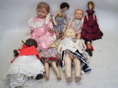Dolls - A mixed collection of various sized Dolls.