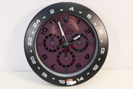 A clock / watch dealers advertising display wall clock, grey dial with three subsidiary dials, 33.