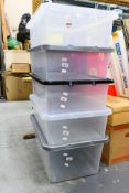 Five clear plastic storage boxes approximately 32L capacity,