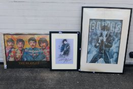 Two framed jigsaw displays comprising The Beatles and Elvis,