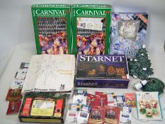 A collection of various boxed Christmas lights,
