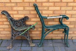 Two pairs of cast metal bench ends. [2].