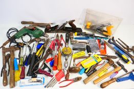 A good collection of various hand tools to include a Bosch SB 400-2 hammer drill and other.
