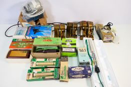 A collection of aquarium accessories to include filters, heaters, pumps and similar.