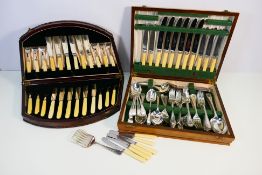 Two canteens of plated cutlery.