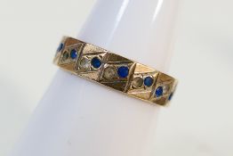 A 9ct yellow gold stone set ring, size L+½, approximately 2.5 grams.