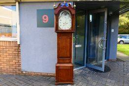 An early 19th century 8-day longcase clock with arched, painted dial signed for Edw Jones, Holywell,