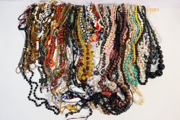 A large quantity of costume jewellery necklaces.