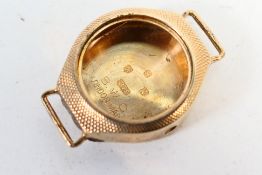 A 9ct gold wristwatch case, Edinburgh assay, approximately 2.5 grams.