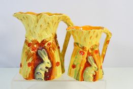 Two Burleigh Ware Rabbit jugs, largest approximately 28 cm (h),