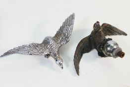 Two vintage Desmo Eagle car mascots, one atop a ball, approximately 17 cm wingspan.