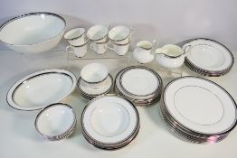 A collection of Royal Doulton table wares decorated in the Sarabande pattern, fifty pieces.