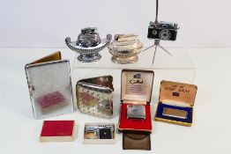Lighters - Eight vintage lighters to include a camera lighter a Colibri molectric in case,