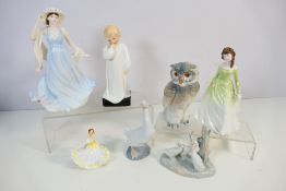 A collection of ceramic figures to include Royal Doulton, Nao, Coalport and similar,