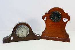 Two vintage car dashboard clocks mounted in wooden cases to form mantel clocks, both Smiths. [2].