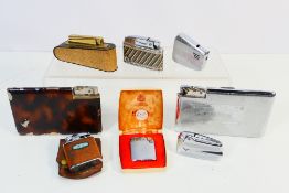 Lighters - Eight vintage lighters to include two cigarette case lighters a Ronson lighter in case