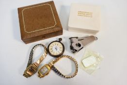 A small mixed lot comprising wristwatches, fob watch, cigar cutter and white metal ingot pendant.