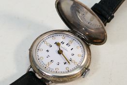 A inter-war period silver cased full hunter braille wristwatch,