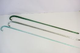 Glass walking sticks x 3. Approximate length 99 cm.