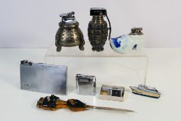 Lighter - A collection of eight vintage lighters to include a tabletop combat grenade shaped PGL,
