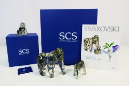 Swarovski - A Swarovski Crystal Society set of two figures from the Endangered Wildlife series,