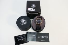 A Citizen Eco Drive chronograph wristwatch, lack dial with black leather strap, ref B612 R008986,