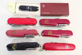 Knives - 7 Victorinox Swiss Army knives, one in original box,