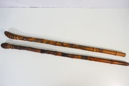 Two Japanese carved bamboo walking stick