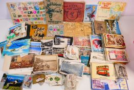 A large collection of stamps, postcards,