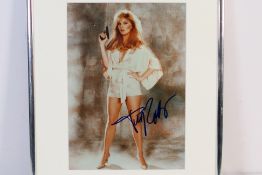 James Bond - A framed and signed colour