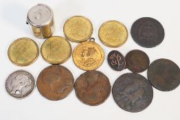 A small collection of coins and tokens t