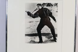 James Bond - A framed and signed black a