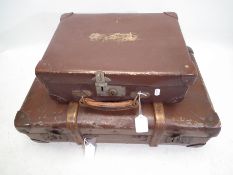 Two vintage cases, one with wooden banding.