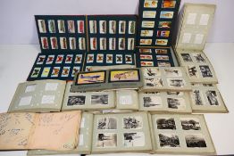 A collection of Senior service and Wills's cigarette card albums, themes to include trains,