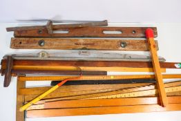 A collection of vintage rules, measures, levels and similar.