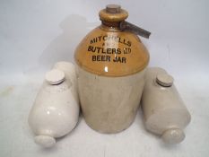 A small collection of stoneware to include a Mitchells & Butlers Beer Jar, approximately 31 cm (h).
