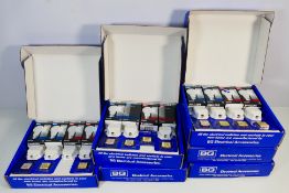 Six packs of BG Electrical Accessories New Home Starter Packs containing light bulbs,