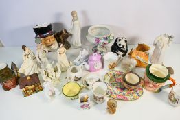 A collection of mixed ceramics to include Wade, Royal Doulton, Aynsley and other.