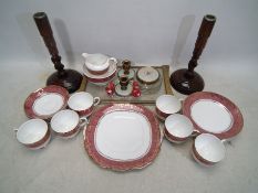 A mixed lot to include tea wares, wooden candlesticks,