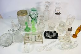 A collection of glassware to include decanters, glass figures, cruet set and other.